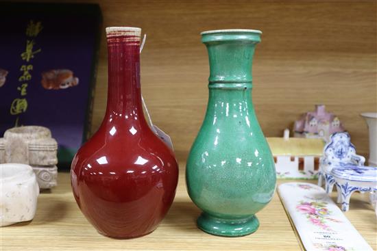 A Chinese sang de boeuf (langyao) vase and a Chinese green crackle glaze vase, 18th/19th century, Height 21cm